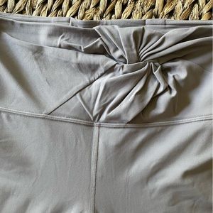 Lavender Lululemon leggings with twist front